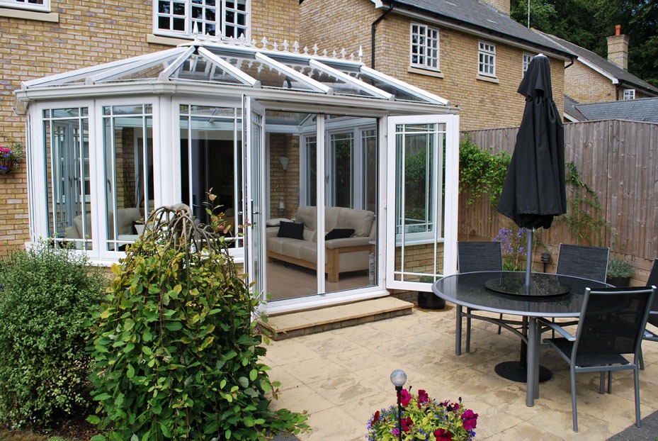 Conservatory with insect screens at the garden doors